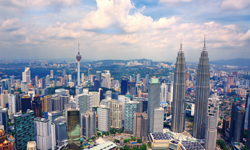 How to Get a Work Visa in Malaysia in 2025 (Without Getting Buried in Bureaucracy) 1 SOCMED POST OPTION 3 3 1