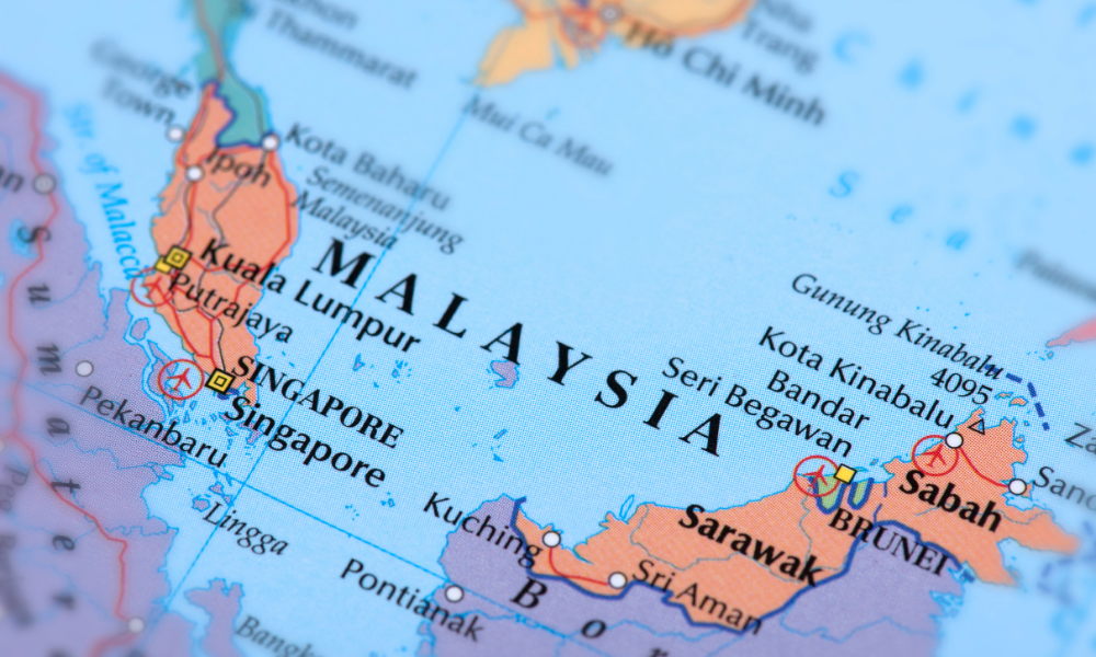 How to Get a Work Visa in Malaysia in 2025 (Without Getting Buried in Bureaucracy) 2 SOCMED POST OPTION 3 4 1